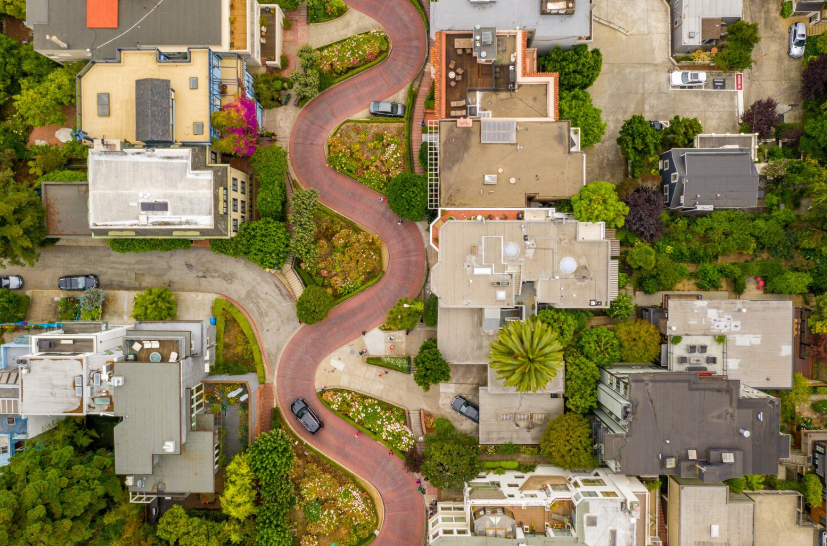 Well-maintained residential neighborhood with tree-lined streets and strong layout indicating long-term home value.